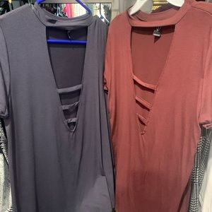 SOLD Two v-cut shirts!
